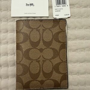 COACH Brown Signature Passport Holder